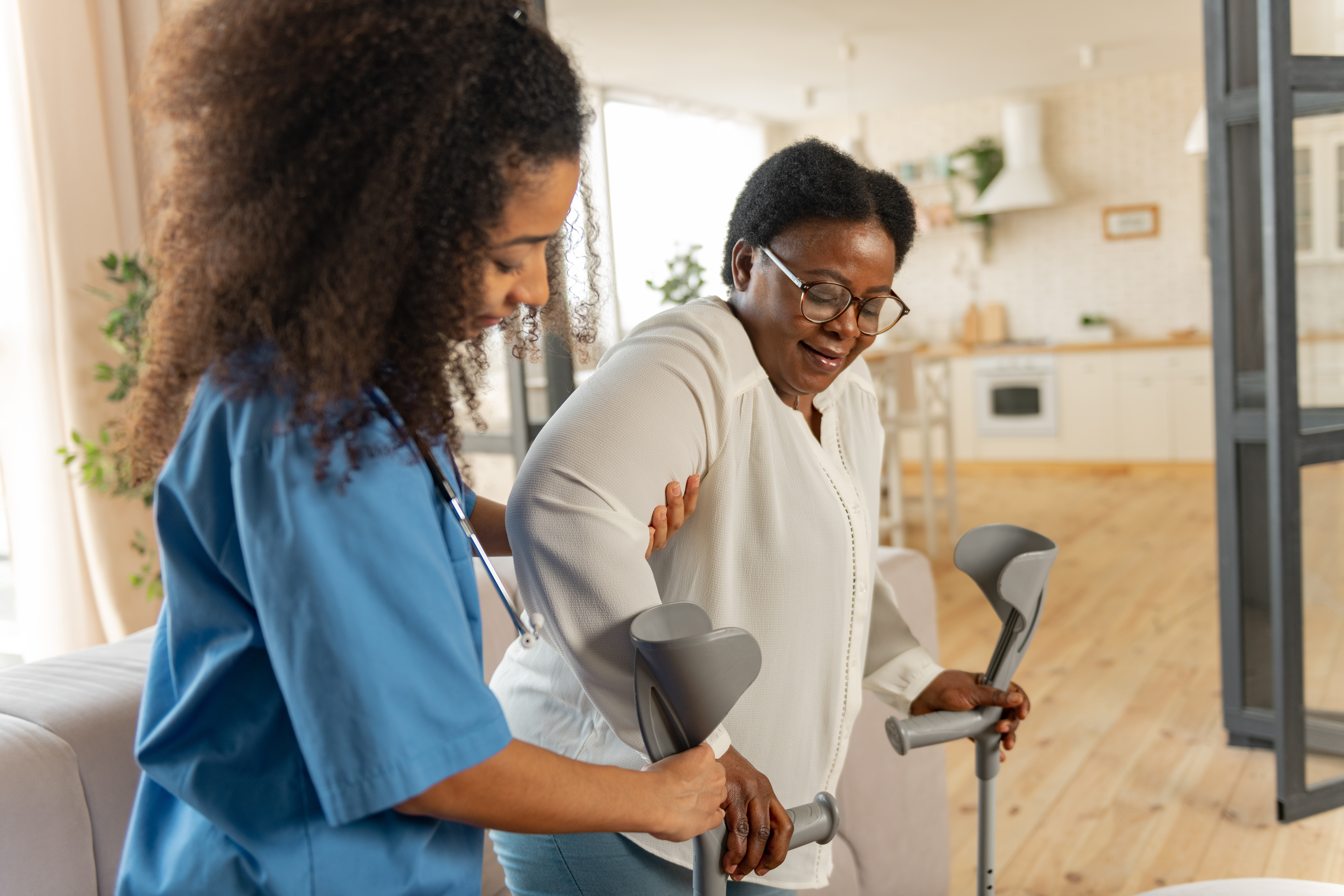 Nurse helping patient