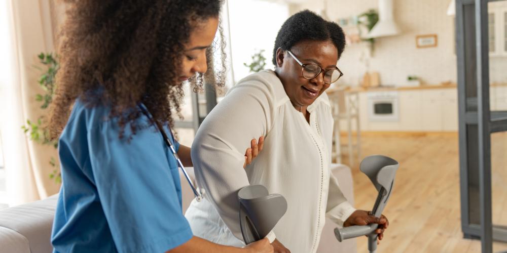 Nurse helping patient