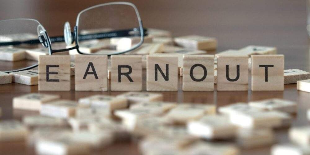 Earnout spelled out in Scrabble tiles